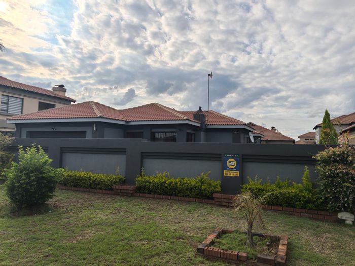 4-Bedroom House For Sale in Aerorand with patio, double garage, and spacious yard.