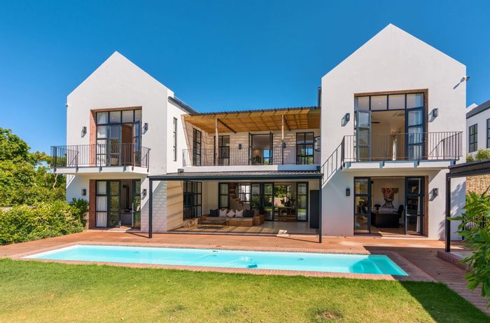For Sale: Spacious Constantia house with 6 en suite bedrooms, pool, and office.