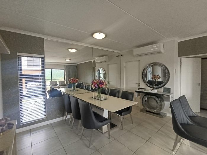 3-Bedroom Apartment To Rent in Ballito Central with air-conditioning and estate amenities.