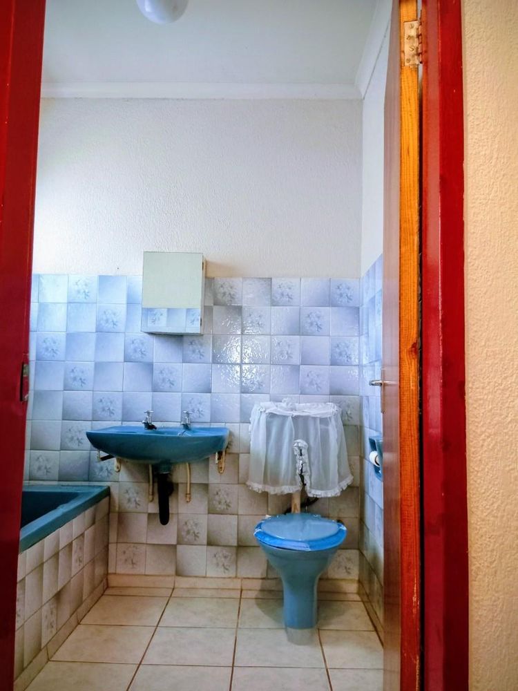 Combined bath and toilet