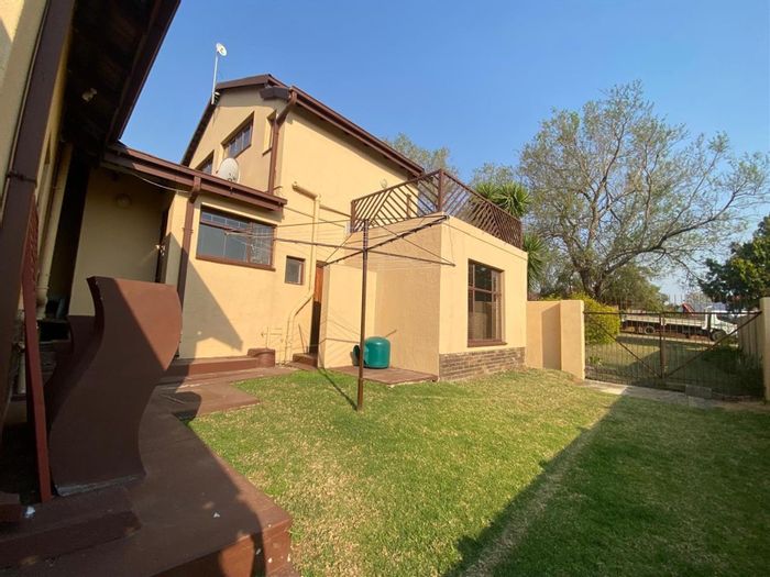 4 Bedroom House For Sale in Aviary Hill with mountain views and versatile spaces.