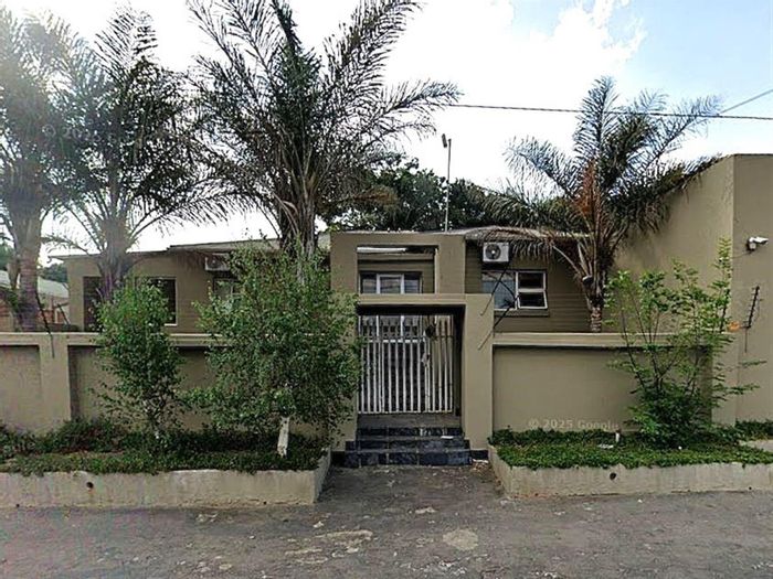 For Sale: Spacious Primrose Hill House with income-generating cottage and security features.