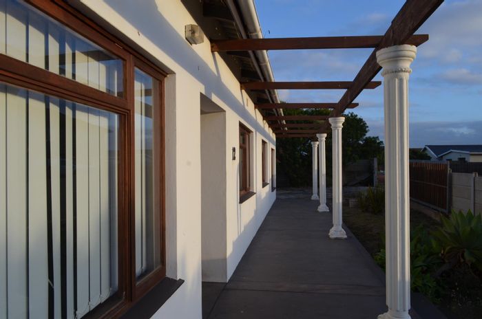 For Sale: House in Gouritsmond Central with spacious living, outdoor entertainment, and dual access.