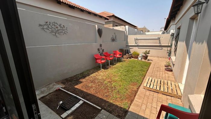 For Sale: Townhouse in Trichardt with 2 beds, security, and backup utilities.