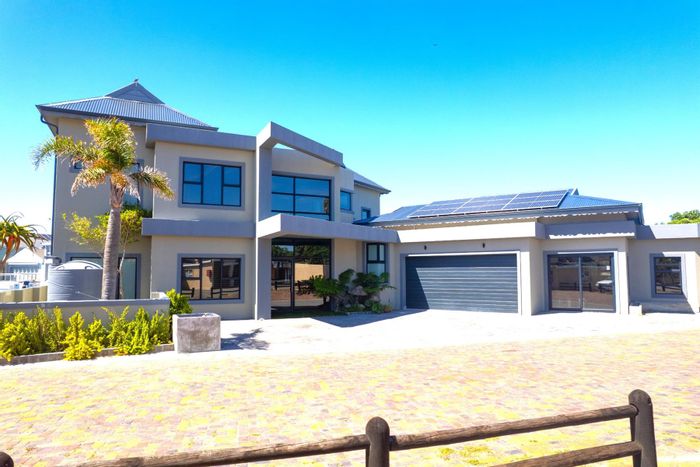 Canal-front house in Marina Martinique with private mooring for two boats. For Sale.