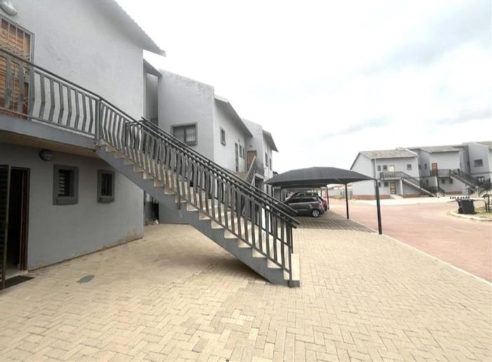 For Sale: Bendor Townhouse with large patio, visitor parking, and security features.