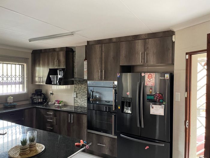 For Sale: House in Kriel Central with 3 bedrooms, double garage, and security features.