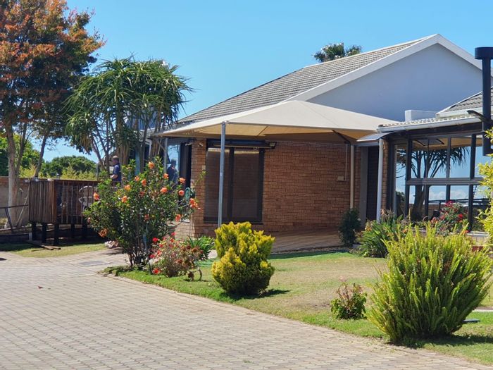 For Sale: Heiderand Townhouse with garden, braai area, and excellent security features.