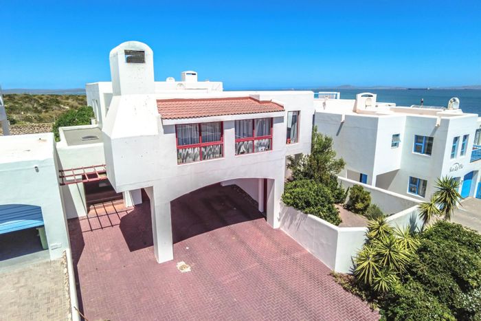 For Sale: House in Paradise Beach with sea views, dual living, and outdoor braai.