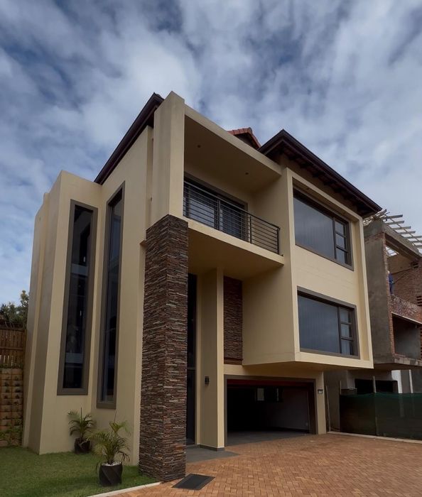 For Sale: House in Umhlanga Central with private lift, garden, and smart-home features.