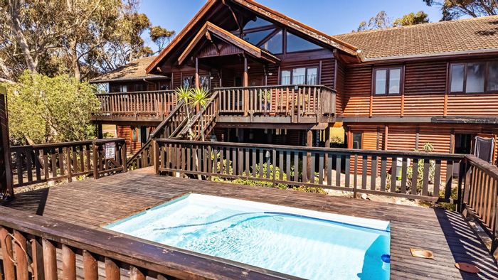 For Sale: House at The Point, 6 bedrooms, lagoon views, guest lodge potential.