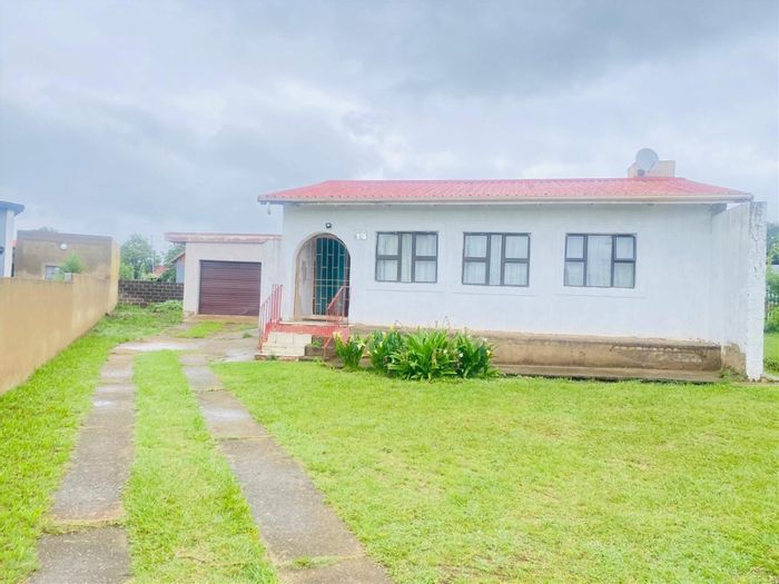 4 Bedroom House For Sale in Amajuba Park with secure yard and garage.