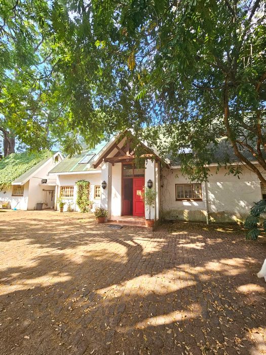 For Sale: Versatile farm in White River Rural with main house, cottages, and pool.