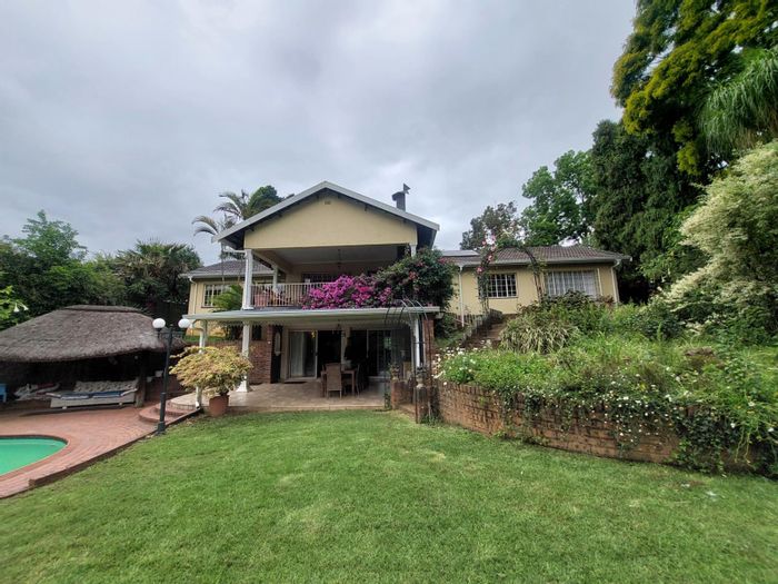 For Sale: Spacious 4-bedroom house in Montrose with pool, flatlet, and garages.