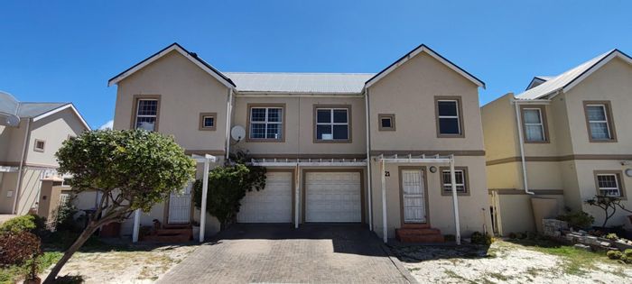 3-Bedroom House in Muizenberg Central For Sale with communal pool and private yard.