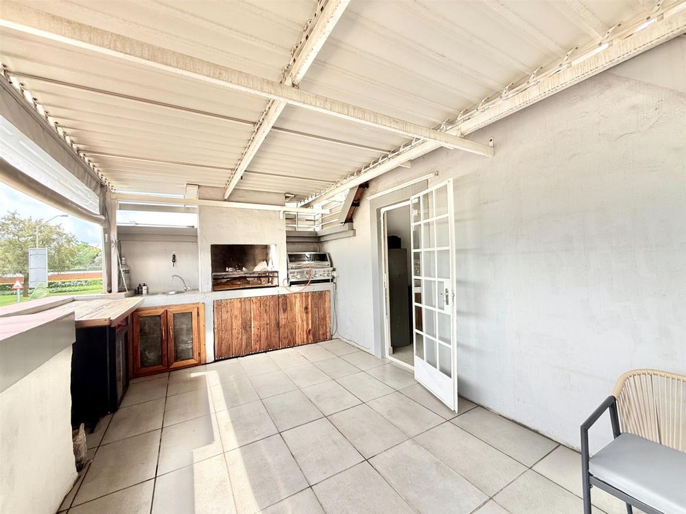 Covered Balcony with outside blinds