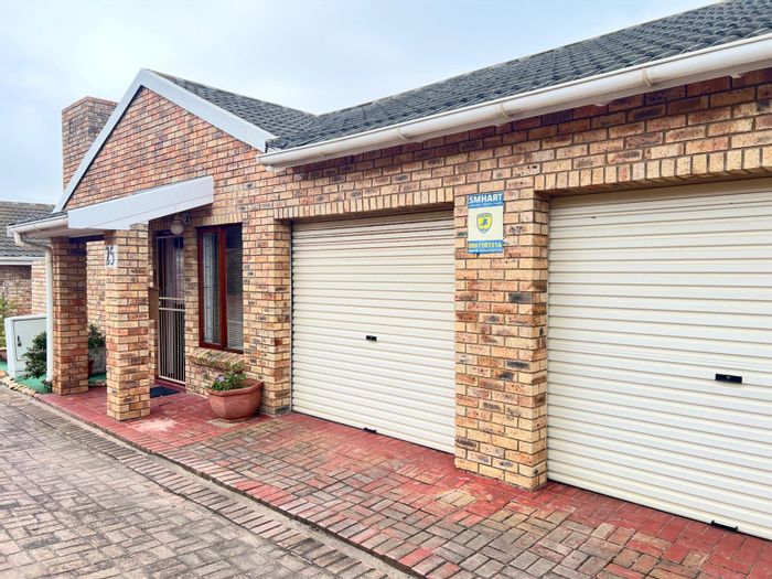 For Sale: Townhouse in Ferreira Town with 3 bedrooms, garages, and pet-friendly garden.