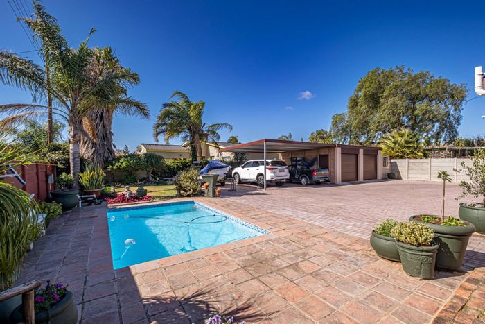 Manor Heights House For Sale: 4 beds, pool, indoor-outdoor living, security features.