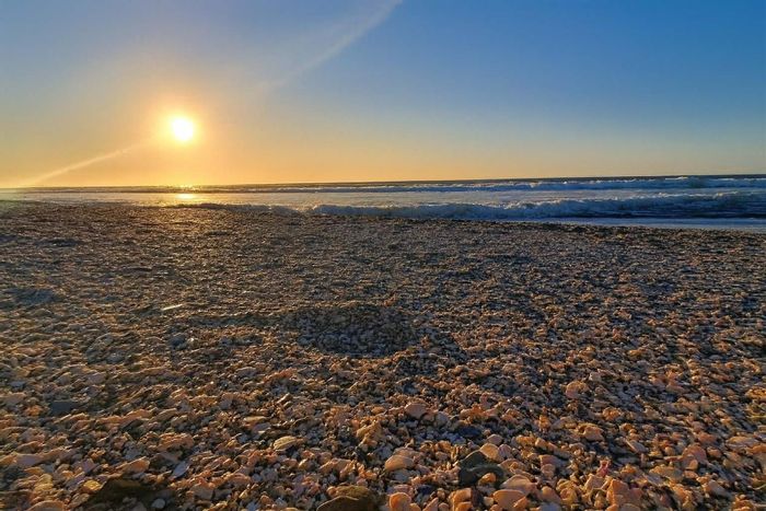 For Sale: 3-Bedroom House in Dwarskersbos, steps from the beach, with garage.