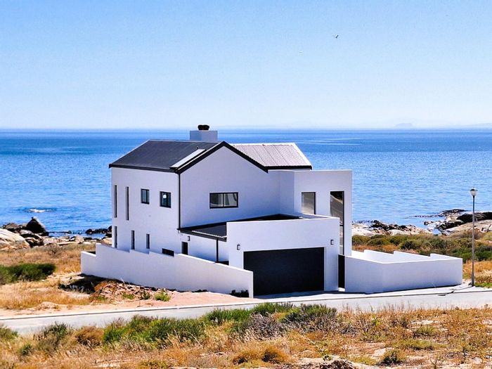 Coastal house for sale in St Helena Views with beach access and panoramic sea views.