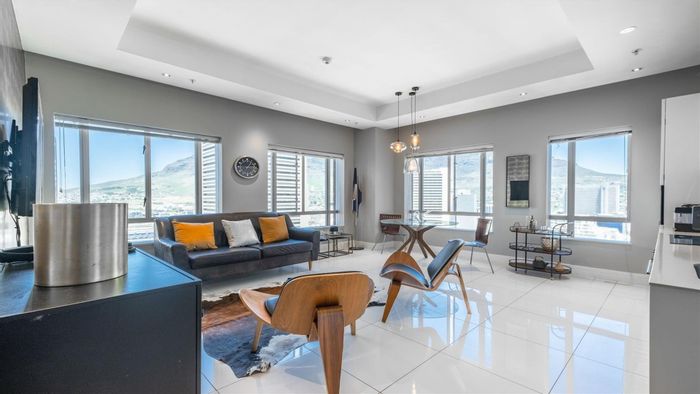 Fully furnished 2-bedroom apartment with hotel amenities in Cape Town City Centre.