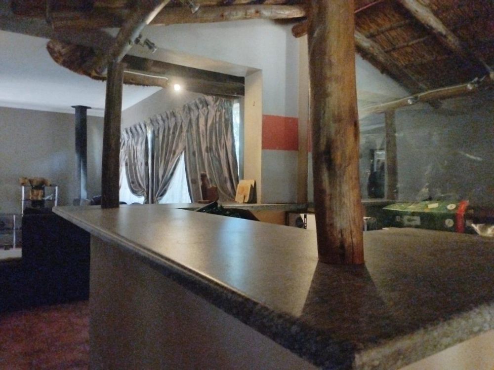 Indoors bar Counter towards Lapa outside