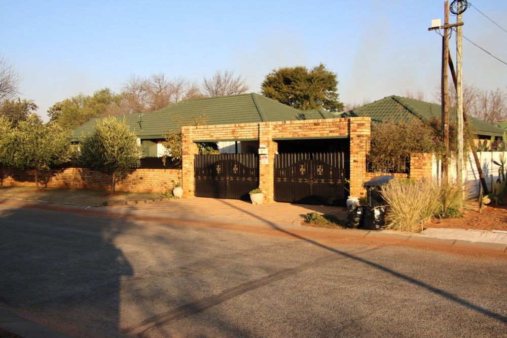 Street view towards garage
