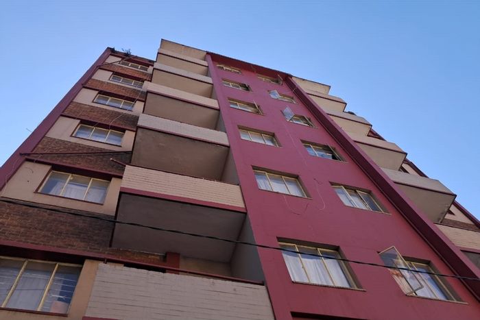 Retail property for sale in Hillbrow: 59 units, prepaid utilities, two shops.