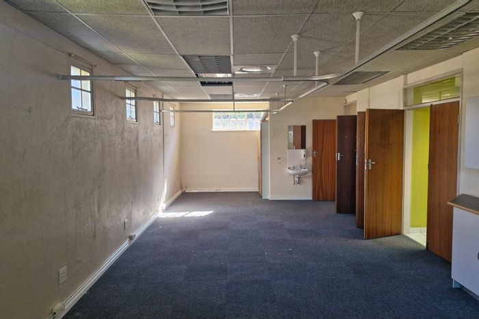 Office to Rent in Wilkoppies: 81sqm, air conditioning, storage, covered parking.