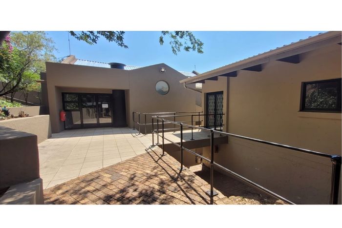 For Sale: Office in Constantia Kloof with rental income and ample parking.