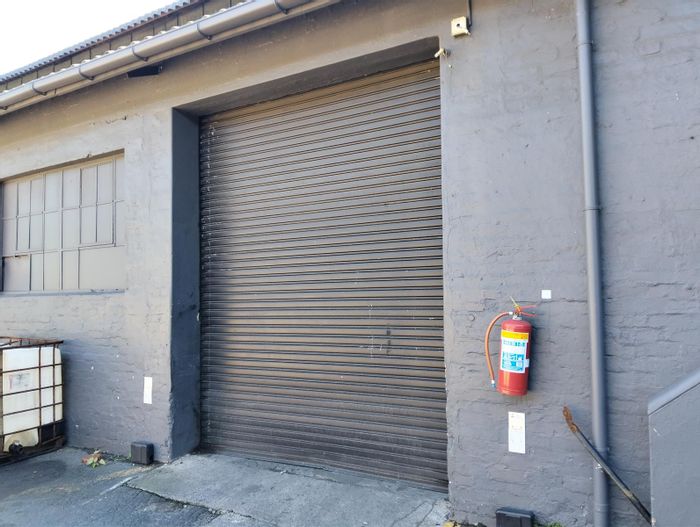 Rossburgh House To Rent: 1400m² warehouse, prime road frontage, versatile use.