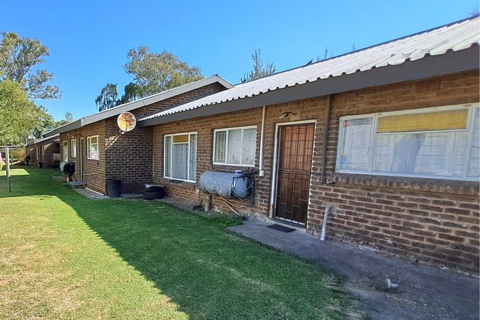 For Sale: Parys Central House with 6 residential units and lock-up garages.