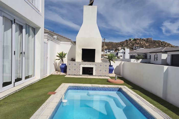 4-Bedroom House For Sale in Sandy Point with Pool and Beach Access