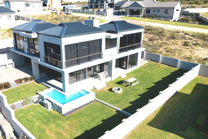 Wavecrest House For Sale: 4 beds, pool, garage, and coastal lifestyle amenities.