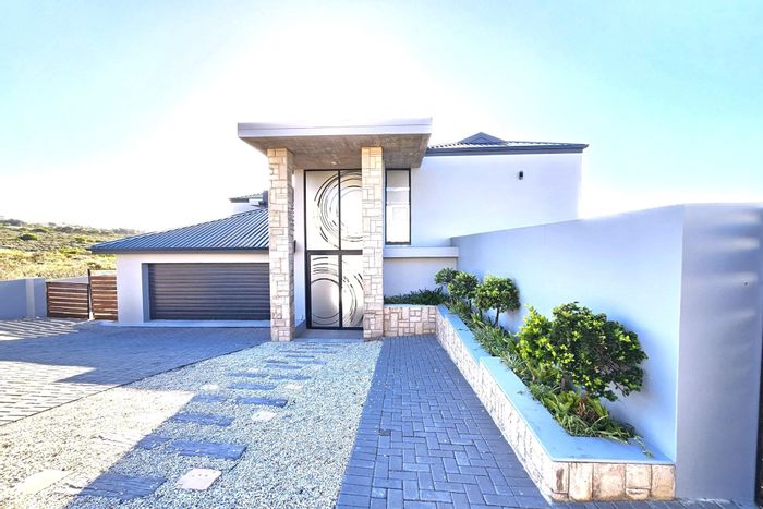 Wavecrest House For Sale: Secure estate, pool, open-plan living, double garage.