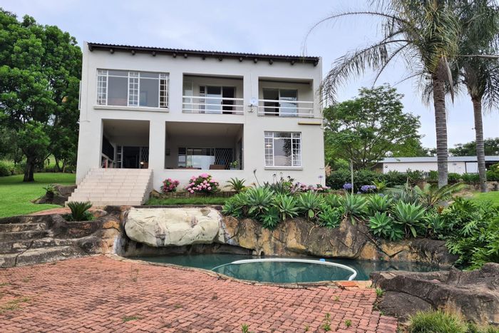 Nelspruit Rural Small Holding For Sale: 4-bed home, workshop, dam, and pool.