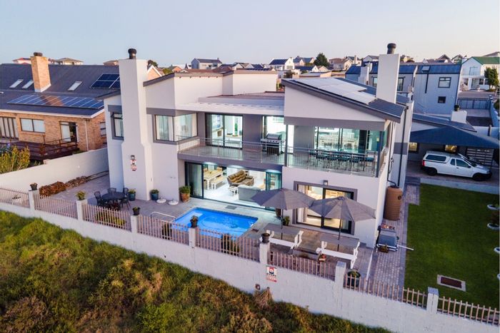 Myburgh Park House For Sale: Three units, lagoon views, Airbnb potential, eco-friendly features.