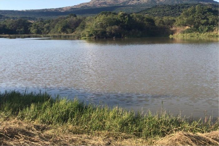 For Sale: 1,093-Hectare Farm in Glencoe Central with diverse agriculture and wildlife.