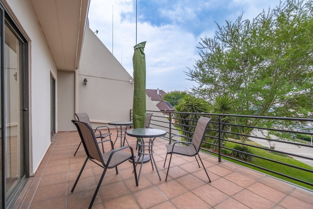 Spacious balcony with garden view