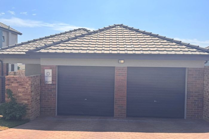 3-Bedroom Townhouse in Lion Pride For Sale with garden, pool, and 24-hour security.