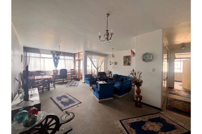 North Beach Apartment For Sale: 2.5 bedrooms, sea views, lift access, close to amenities.