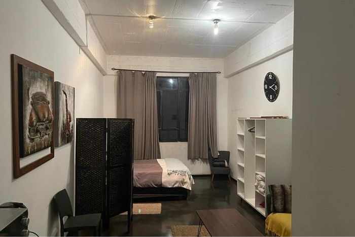 For Sale: Maboneng Apartment with furnished interiors, rooftop access, and secure parking.