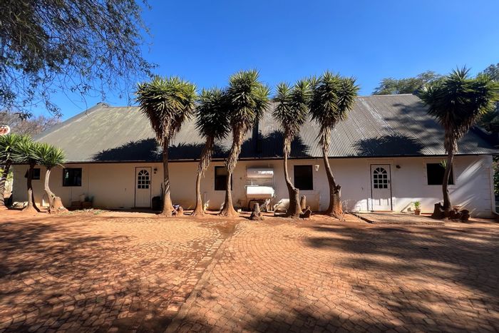 For Sale: Glen Austin AH House with 10 cottages, income potential, and development space.