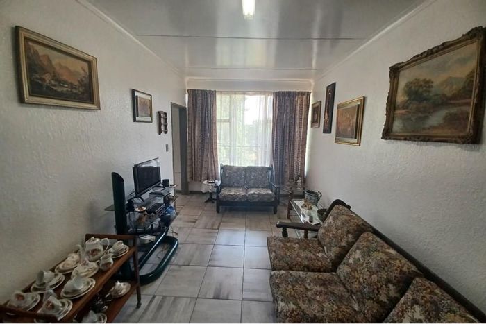 For Sale: Secure 2-bedroom apartment in Brakpan Central with updated kitchen amenities.