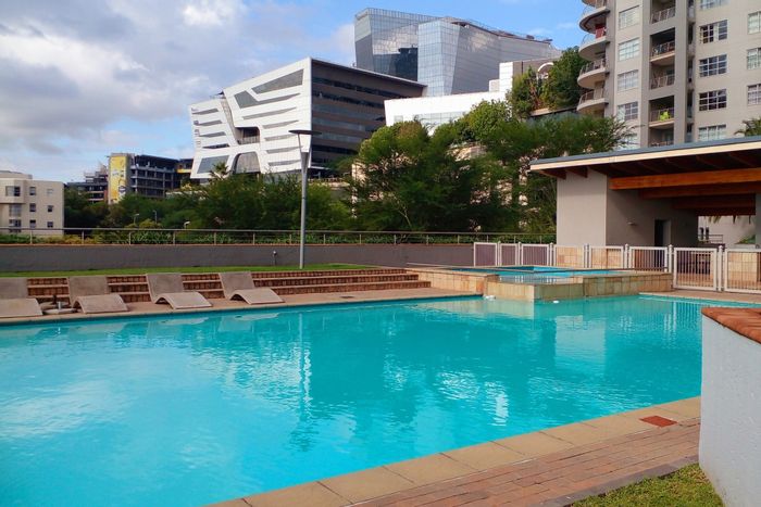 For Sale: 2-Bedroom Apartment in Sandton Central with Pool, Parking, and Security.