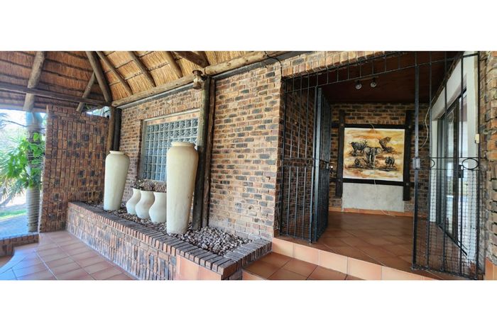 Karino Small Holding For Sale: Spacious home, pool, rental income, and development potential.