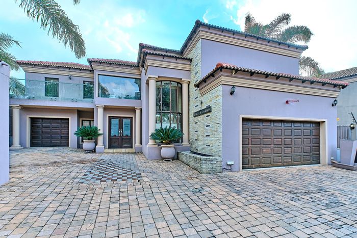 For Sale: Sandown House with automation, pool, cinema, and security features.