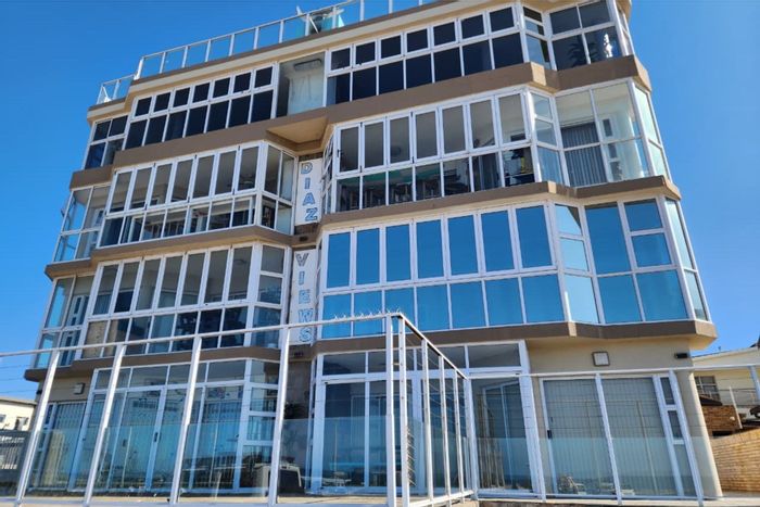 For Sale: Apartment in Jeffreys Bay Central with beach access, parking, and braai area.