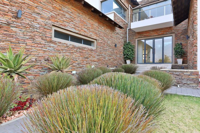 For Sale: Spacious 5-Bedroom House in Waterfall Country Estate with Entertainer's Kitchen.