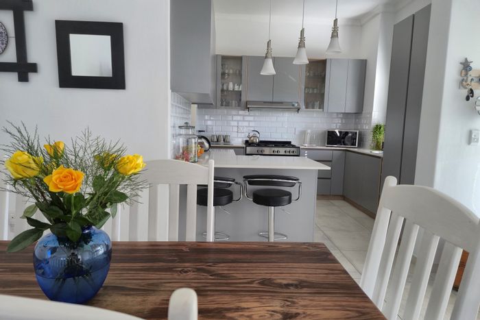 Coastal house for sale in Sandy Point with garden, security, and garage access.